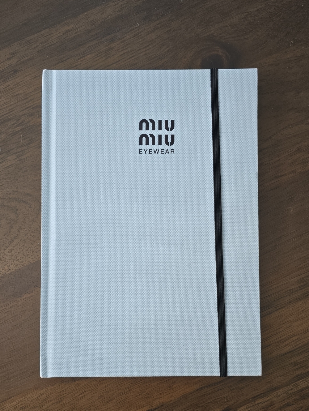 Miu Miu Light Gray Hardcover Notebook with Black Elastic